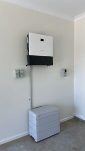 solar inverter and a battery on a wall