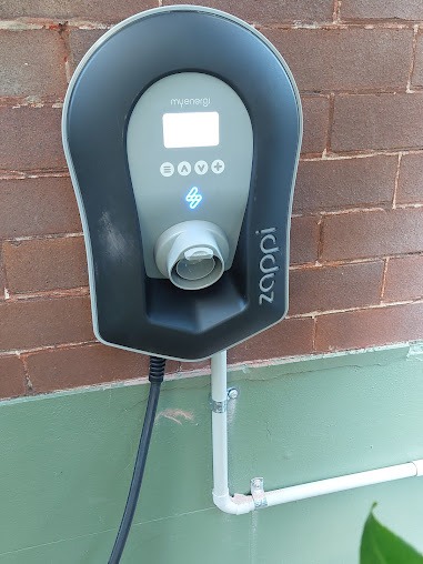 Zappi EV charger installed on wall for solar energy storage in Sydney.