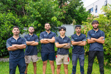 Charlie Sparks team of solar installers in Sydney, showcasing expertise and teamwork.