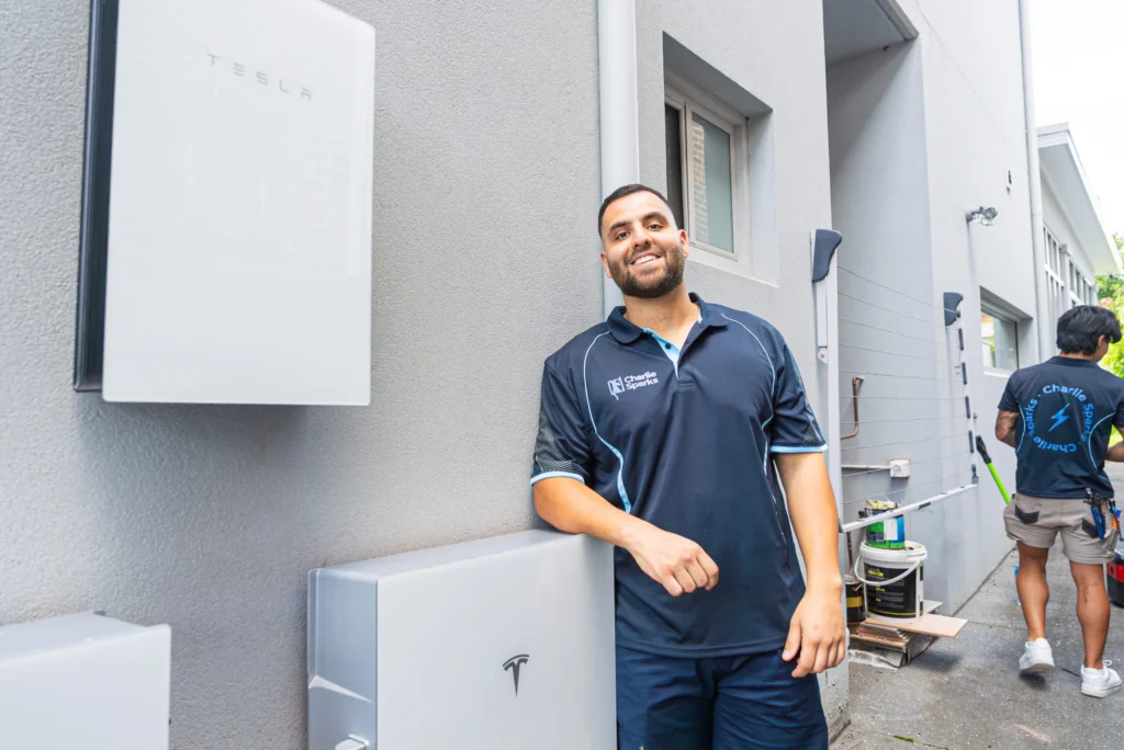 Solar installer in Sydney demonstrating battery storage solutions for homes.