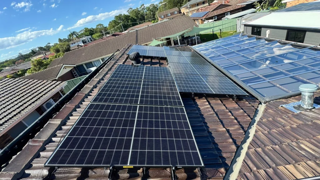 Solar panels installed on rooftops in Sydney by Charlie Sparks.