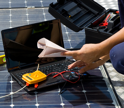 working on solar panels